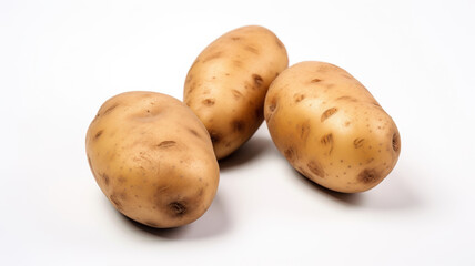 Fototapeta premium Three Potatoes on a White Background