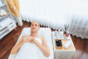 Caucasian woman customer enjoying relaxing anti-stress spa massage and pampering with beauty skin...