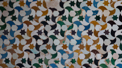 Ancient Nasrid coloured ceramic mosaic in the Alhambra in Granada