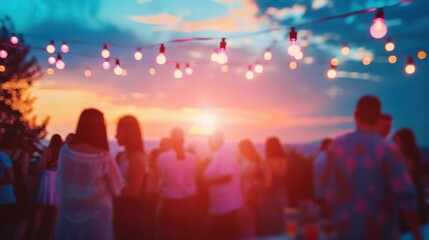Fototapeta premium Dreamy blurred pastel scene of a summer celebration at sunset.
