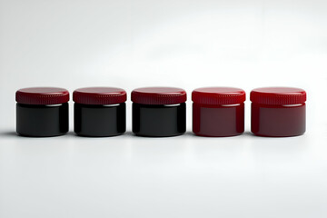 A side view of six sleek bottle caps, each designed for branding or packaging display, set on a minimalist backdrop.