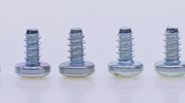 Metal screws for fastening equipment. Soft focus. Close-up. 