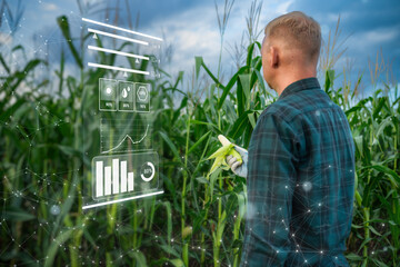 Smart farmer using apps with tablet concepts, modern agricultural technologies and visual icons....