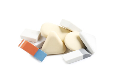 Different new erasers isolated on white. School stationery