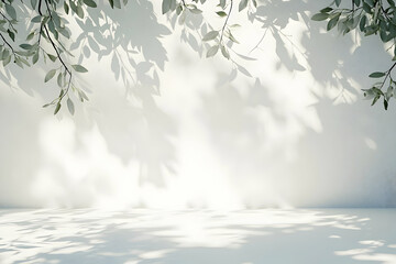 A white wall background with soft light casting tree leaf shadows on the floor, perfect for spring/summer beauty product displays.