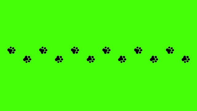 Animated paw prints appearing or moving across a green background