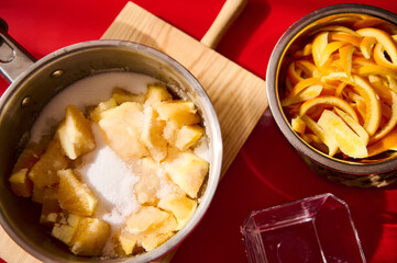 Fresh apple and orange peels prepared for making homemade jam