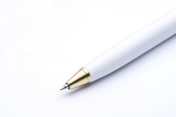 A close-up shot of a pen on a white surface, ideal for use in graphics and design projects
