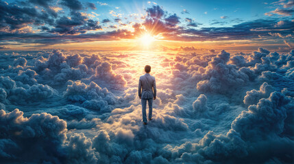 Obraz premium Businessman standing on clouds at sunset, looking towards bright sunlight. Surreal conceptual representing spirituality, achievement, and enlightenment.