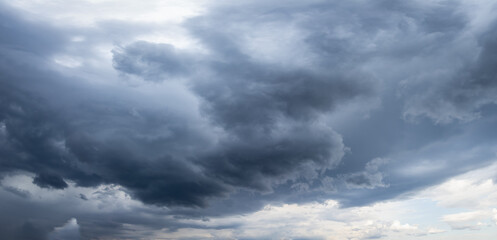 Dark storm clouds gathering in the sky creating dramatic scene