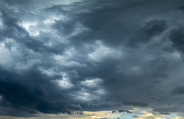 Dark storm clouds forming in the sky, creating dramatic scene
