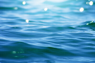 Lights on sea background. Waves.