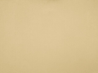 Ivory beige yellow paint wall texture or background with grainy, textured, gotele, scratched, rough and scratchy effect for typical Mediterranean house, chalet and villa exteriors in Spain.