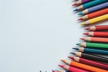 Fototapeta premium Colorful wooden pencils arranged in curved line pattern on light gray background, perfect for education, creativity, and back to school concepts with copy space.