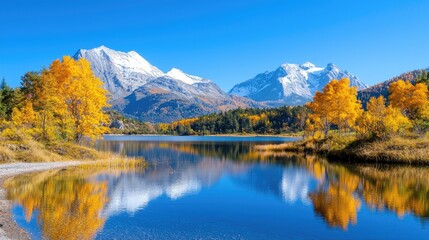 Fototapeta premium Autumnal lake reflecting snow-capped mountains; scenic landscape for travel brochures (1)