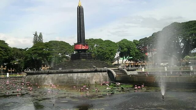 Alun-Alun Tugu is a round square located in front of the City Hall of Malang City, East Java. The square was built in 1920 by the Dutchman Thomas Karsten, surrounded by fountains and lotus ponds. 