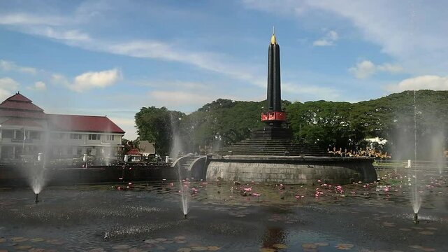 Alun-Alun Tugu is a round square located in front of the City Hall of Malang City, East Java. The square was built in 1920 by the Dutchman Thomas Karsten, surrounded by fountains and lotus ponds. 