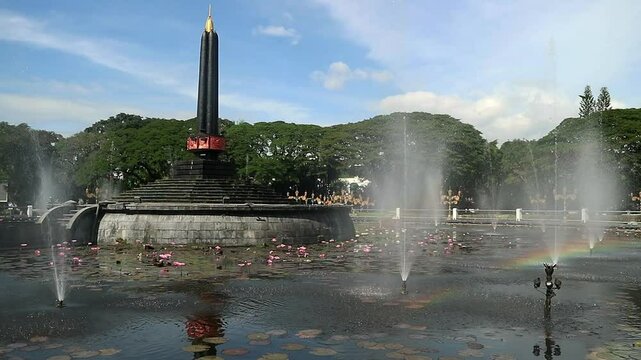 Alun-Alun Tugu is a round square located in front of the City Hall of Malang City, East Java. The square was built in 1920 by the Dutchman Thomas Karsten, surrounded by fountains and lotus ponds. 