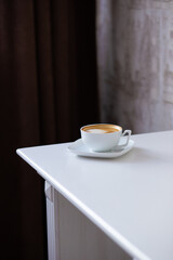 a cup of fragrant coffee in a restaurant on the table