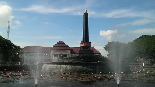 Alun-Alun Tugu is a round square located in front of the City Hall of Malang City, East Java. The square was built in 1920 by the Dutchman Thomas Karsten, surrounded by fountains and lotus ponds. 