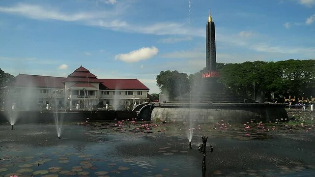 Alun-Alun Tugu is a round square located in front of the City Hall of Malang City, East Java. The square was built in 1920 by the Dutchman Thomas Karsten, surrounded by fountains and lotus ponds. 