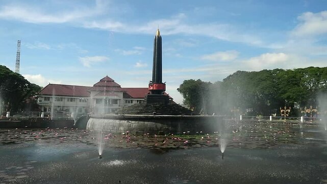 Alun-Alun Tugu is a round square located in front of the City Hall of Malang City, East Java. The square was built in 1920 by the Dutchman Thomas Karsten, surrounded by fountains and lotus ponds. 