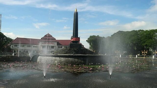 Alun-Alun Tugu is a round square located in front of the City Hall of Malang City, East Java. The square was built in 1920 by the Dutchman Thomas Karsten, surrounded by fountains and lotus ponds. 