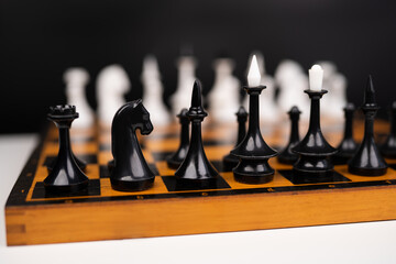 beautiful playing chess on the chessboard before the game
