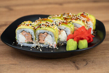 delicious traditional Japanese sushi and rolls on a plate
