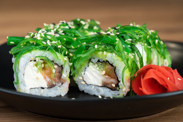 delicious traditional Japanese sushi and rolls on a plate