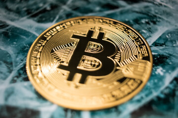 Golden Bitcoin Coin on Futuristic Digital Technology Background