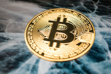 Golden Bitcoin Coin on Futuristic Digital Technology Background
