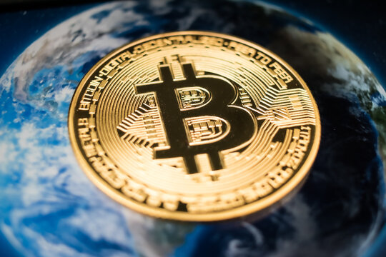 Golden Bitcoin Coin on Futuristic Digital Technology Background