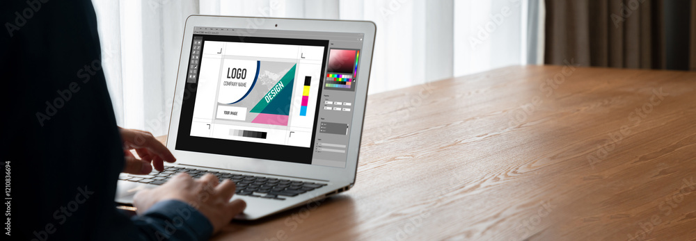 Poster graphic designer software for modern design of web page and commercial ads showing on the computer s