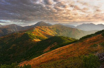 Panoramic view of the Tatra Mountains range during golden hour