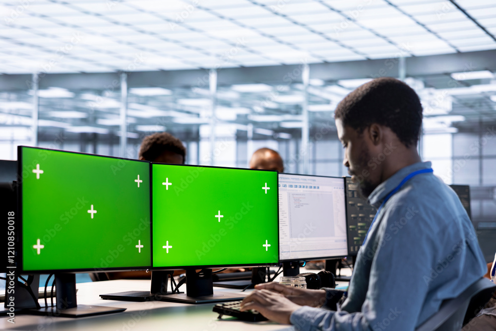 Poster software developer in data center using diagnostic tools on multi monitor mockup pc to identify root