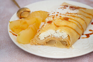 Sweet autumn pancakes with cottage cheese and apples, winning kitchen table with spices