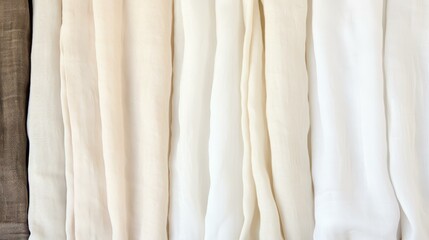 Fototapeta premium Linen fabric rolls neatly lined up, perfect for creating stunning banners or eyecatching posters for any occasion.
