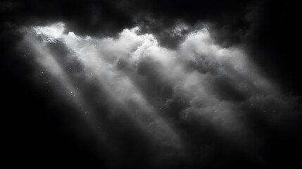 Obraz premium Light beams break through dark storm clouds