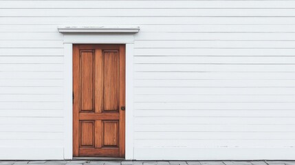 Wooden door on white clapboard siding.