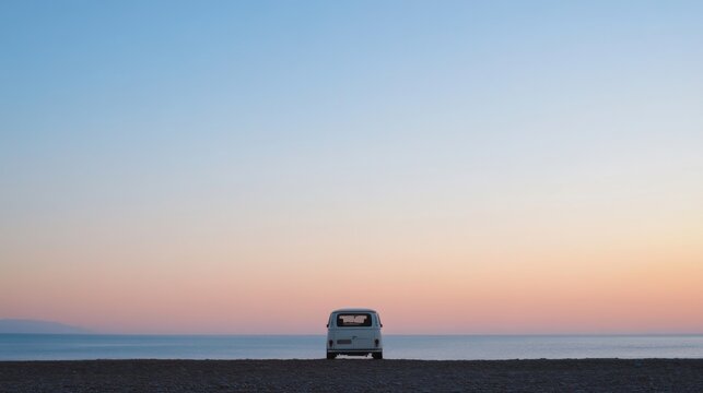 Serene sunset view with a vintage van parked on a beach.