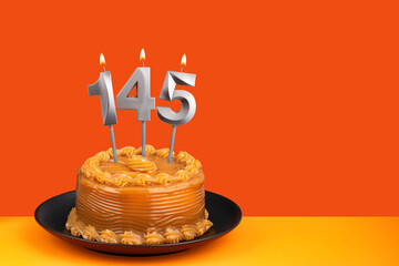 Birthday cake with dulce de leche frosting - Candle number 145