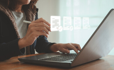Business Document Review Quality Control Process Management System Technology. Woman use laptop...