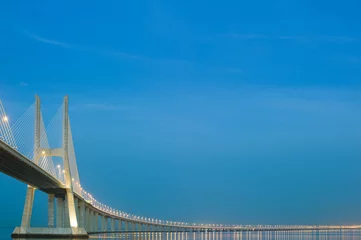 Peel and stick wall murals Vasco da Gama Bridge at Dusk in Lisbon, Portugal