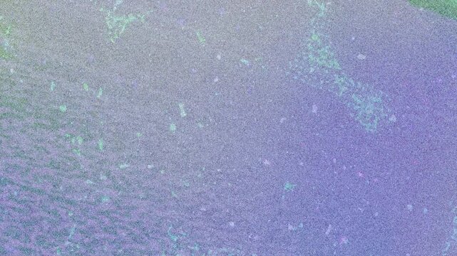 An abstract grainy gradient blur grunge texture motion graphic background design.