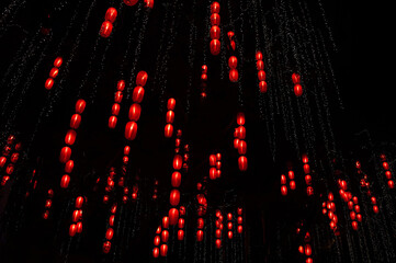 Red lanterns abstract pattern background which look like digital binary bits streaming
