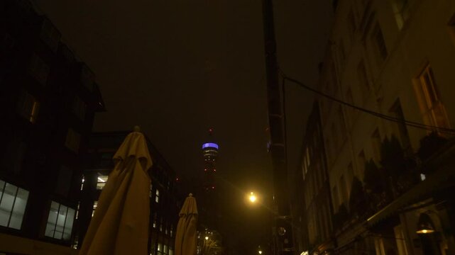 Street Lights Look Up with High Buildings British Telecom Tower Background Night