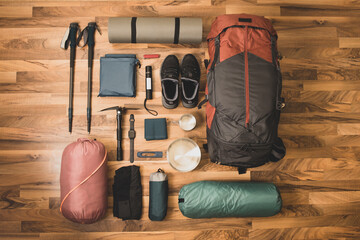 Composition of tourist equipment on the floor