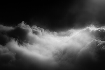 Obraz premium Dramatic monochrome cloudscape, dark moody sky with light breaking through.