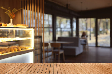 Empty wooden table in restaurant, space for design